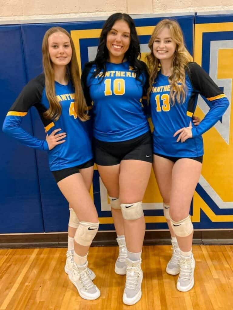 Newberry volleyball seniors Evalyn Guild (4), Alexis Boyd (10) and Hannah Rone (13)