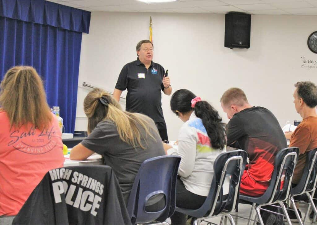 Stephen Daley, founder of radKIDS, trains 14 instructors at Newberry Elementary School.