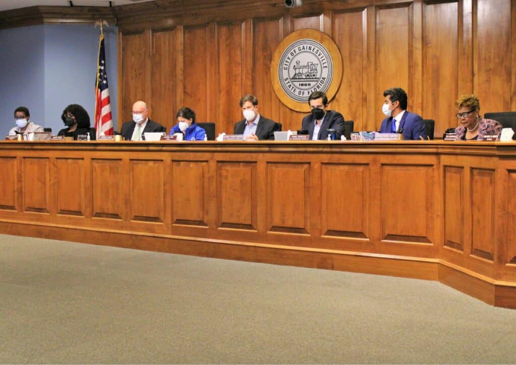 The Gainesville City Commission approved three ordinances that will combine four single family zoning categories into a new neighborhood residential zoning on Thursday.