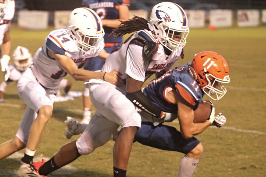 Bronson's Zach Turner tackles Branford Austin Malaguti.