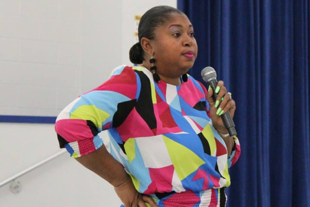 Diyonne McGraw speaks at GNV4ALL meeting on Wednesday.