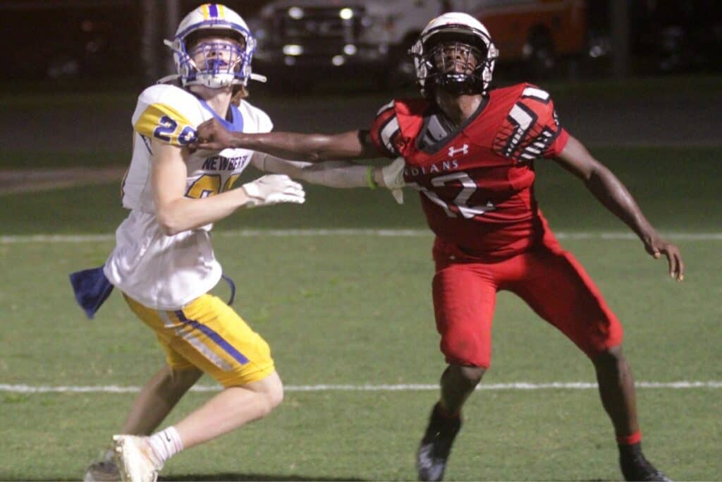 Fort White's Najeeb Smith fights for position in end zone.