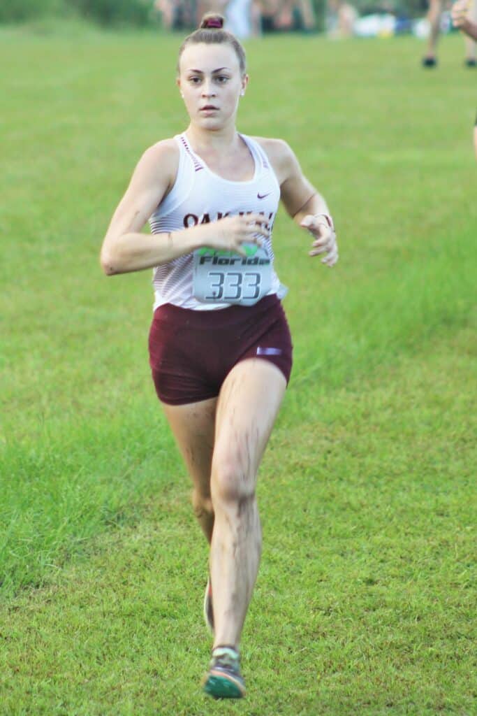 Oak Hall's Sydney Miller runs at the Bobcat Classic Invite.
