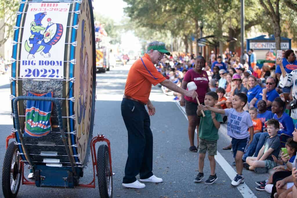 2022 UF Homecoming Parade kids and the Big Boom drum.