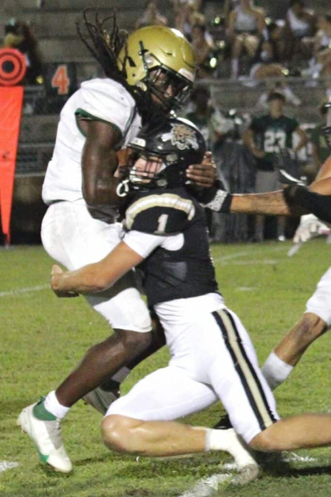 Buchholz's Donny Hiebert with a stop against Fleming Island on Thursday.