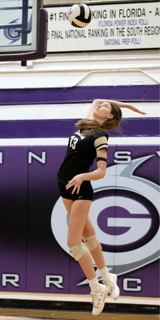 Buchholz's Riley Murray serves against Gainesville on Tuesday.