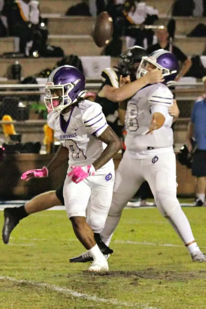 Buchholz's Thomas Weinhardt forces GHS Tommy Coyne to fumble on Thursday.