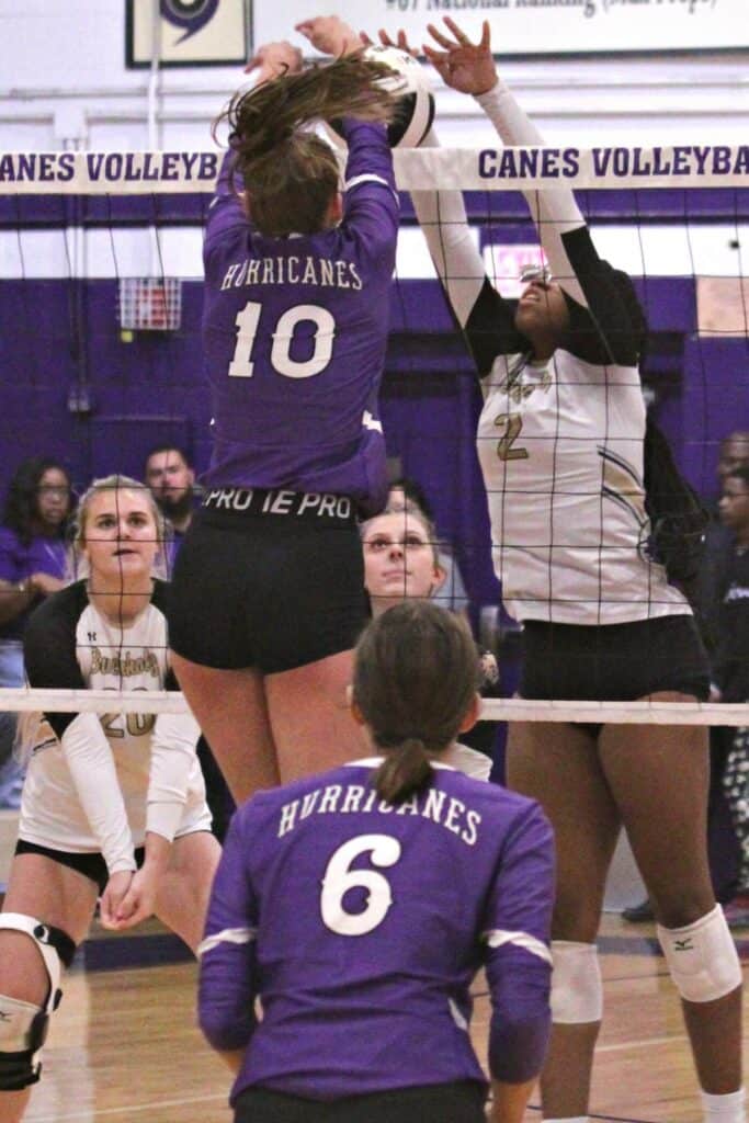 Gainesville's Charlotte Gravlee and Buchholz's Brooke Hankerson battle at the net.