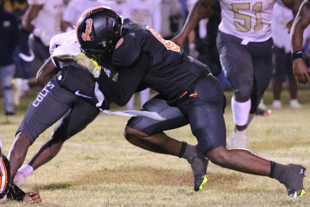 Hawthorne's Isaiah Donaldson with a tackle against North Marion on Friday.
