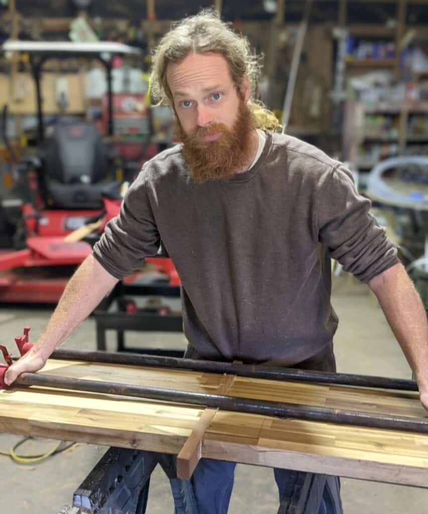 Micanopy artist Josh Dissell at woodworking bench