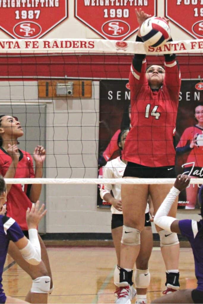 Santa Fe's Kimberly Daniels with a block against Space Coast on Tuesday.