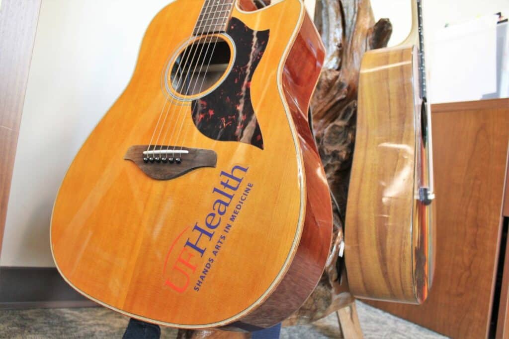 UF's Arts in Medicine Department uses guitars and other art to help patients.
