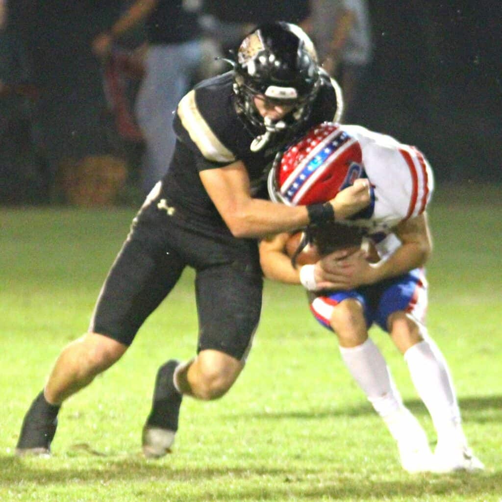 Buchholz's Donny Hiebert with a tackle against Pace on Friday.