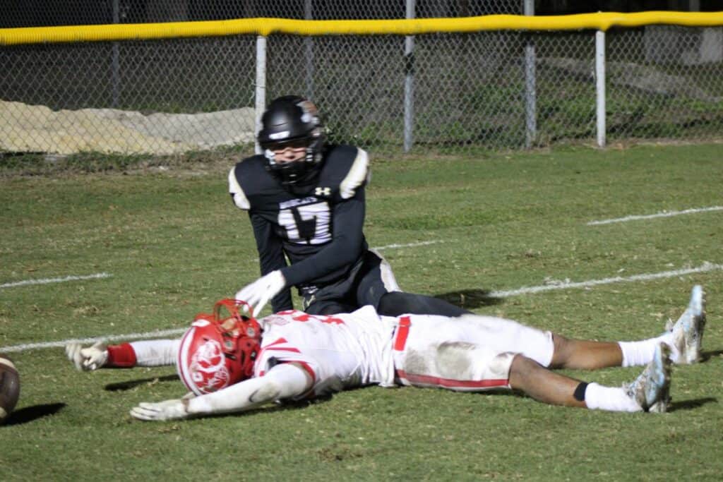 Buchholz's Matthew Kade breaks up an end zone pass against Crestview on Friday.