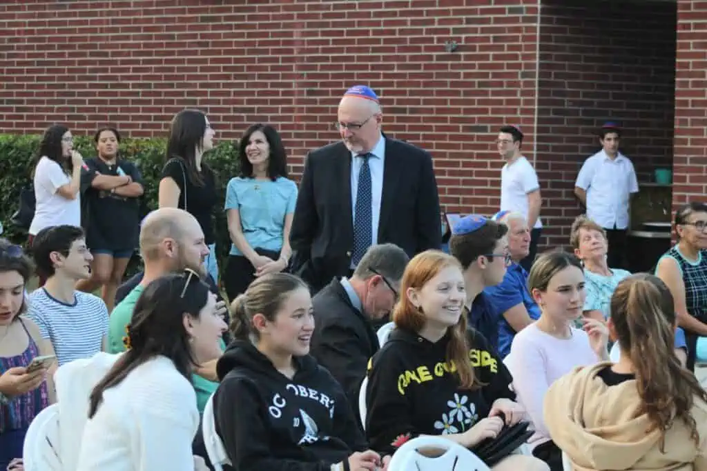 Crowd gathers at Chabad UF Jewish Student and Community Center’s special solidarity gathering on Friday.
