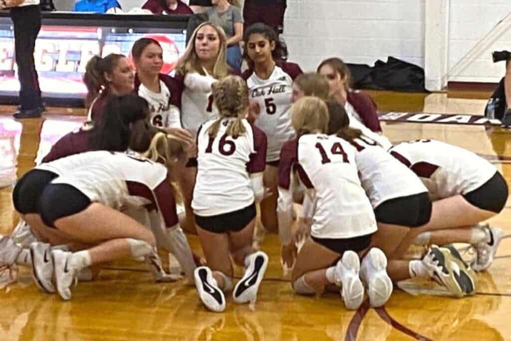 Oak Hall huddle before its Class 2A-Region 1 Final against Christ’s Church Academy on Tuesday.