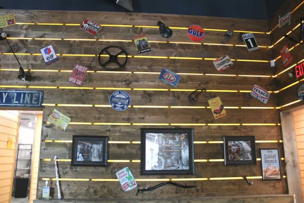 A wall at Ford's Garage restaurant filled with memorabilia.