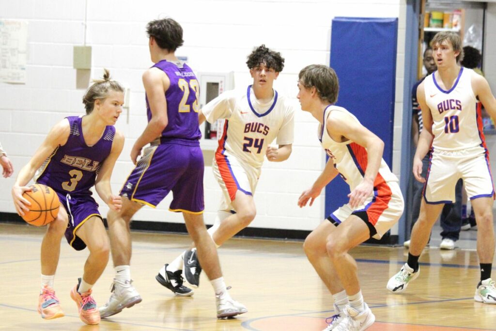 Bell's Kaden Reed looks for opening against Branford's defense on Wednesday.