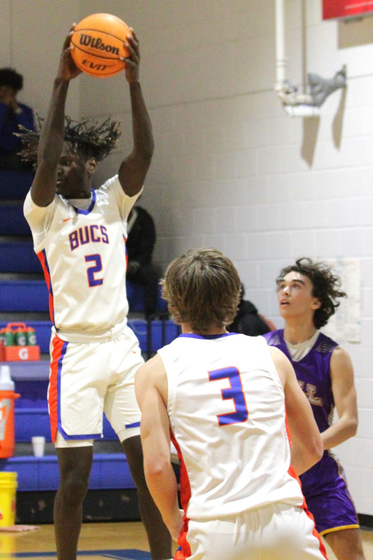 Branford's Eric Turner with a rebound against Bell on Wednesday.