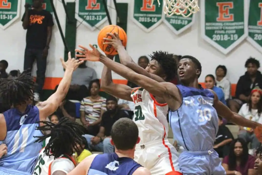 Eastside's Lamarion Houston battles P.K. Yonge's Isaiah Cooper for a rebound Tuesday night.