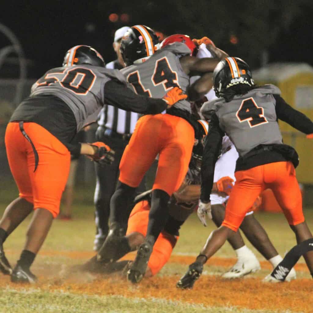 Four Hornet defenders swam and force a loss of yardage against Blountstown on Friday