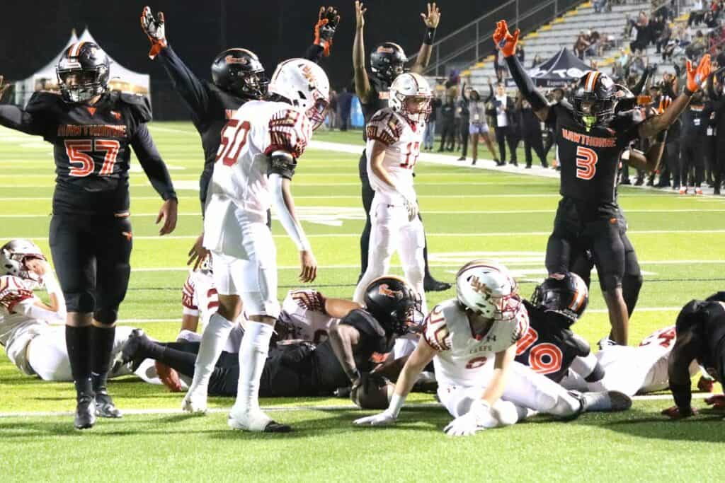 Hawthorne's Brian James scores the first touchdown of contest against Northview on Saturday.