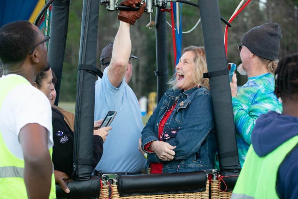 Pamela Mann of Ormond Beach laughs after the sudden spurting sound of propane startled her.