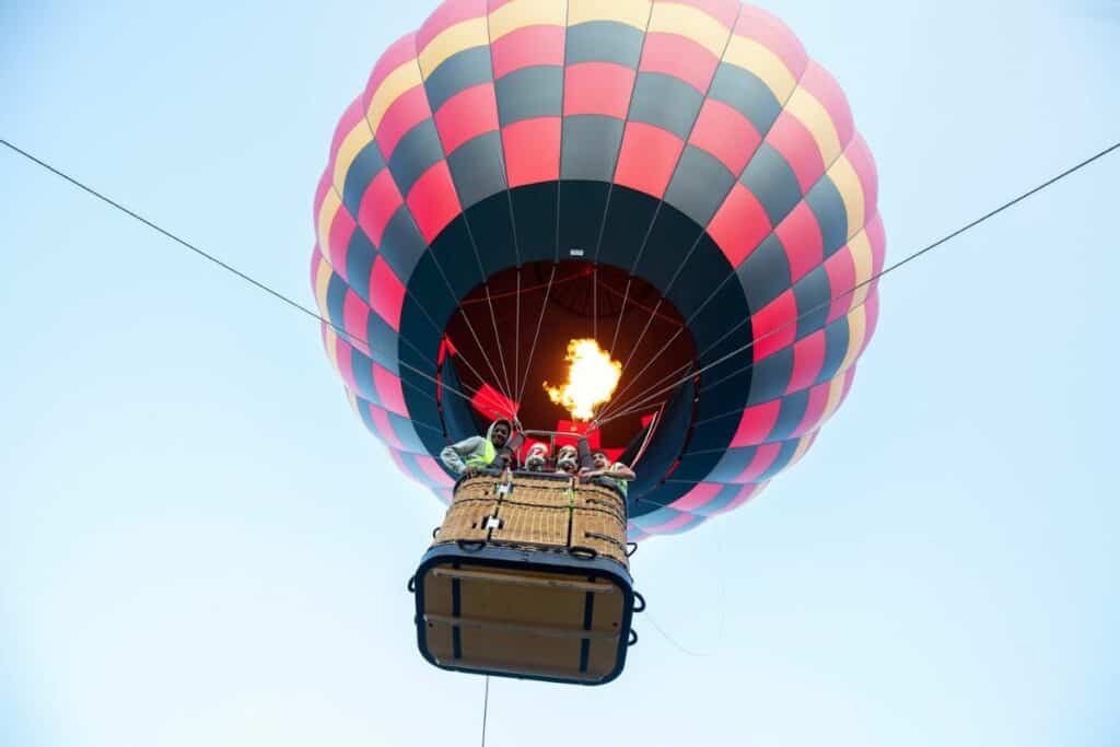 Santa Fe Community College students who volunteered at the festival earned a free ride into the sky.