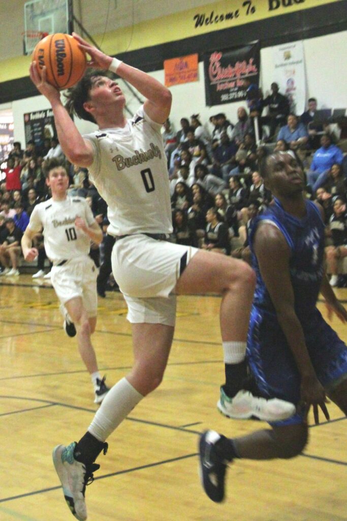 Buchholz's Jacob Sterck drives to the basket against P.K. Yonge on Wednesday.