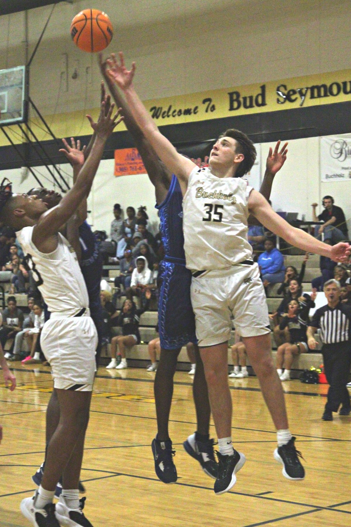 Buchholz's Palmer Walton battles for a rebound against P.K. Yonge on Wednesday.