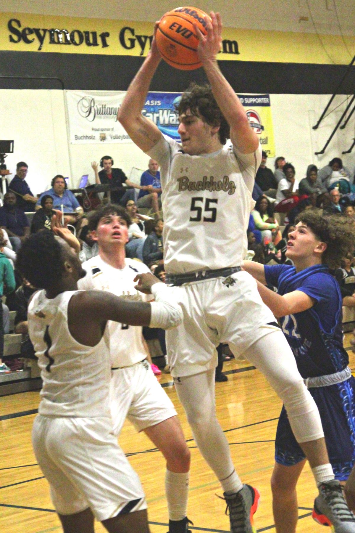 Buchholz's Ryan Webster with a rebound against P.K. Yonge on Wednesday.