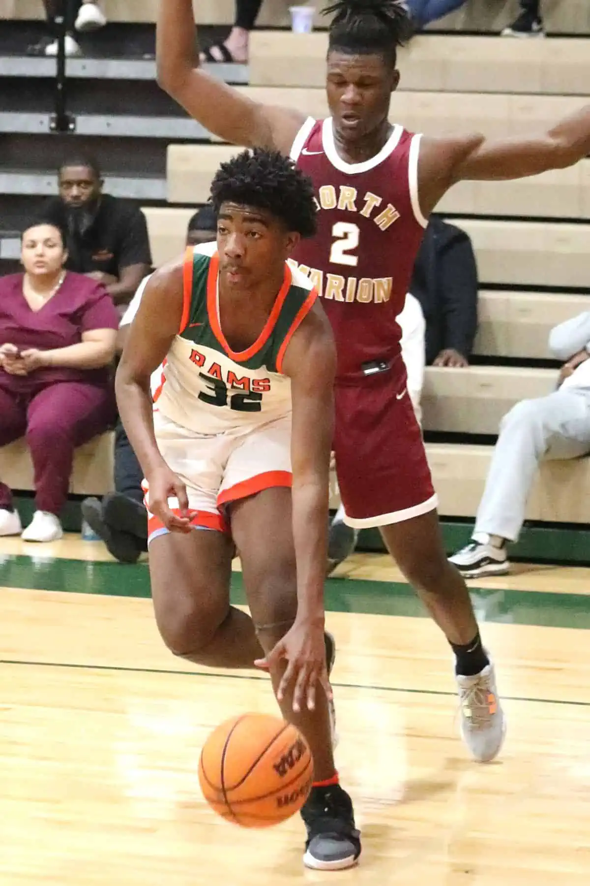 Eastside's Zavian Douglas drives the baseline against North Marion on Friday.