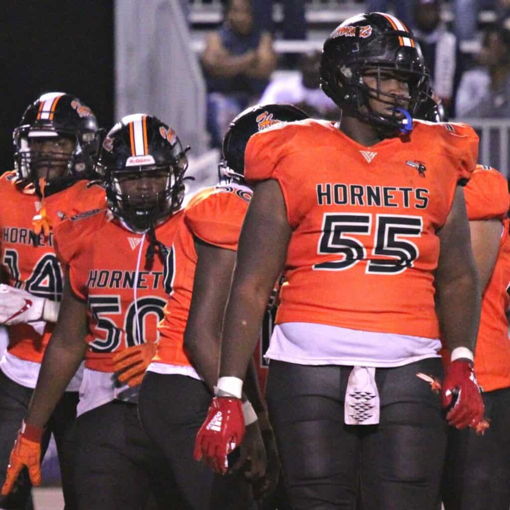Hawthorne Darian Owens (50) and Mozell Williams (55) anchored the offensive line for the Class 1R state champion Hornets in 2022.