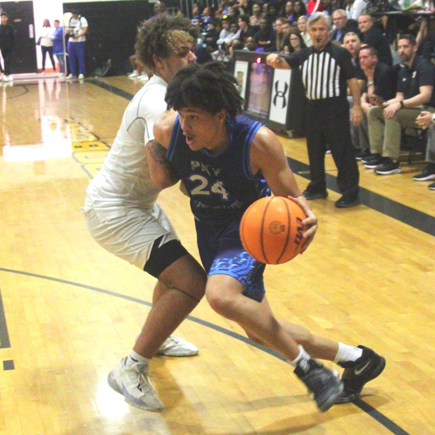 P.K. Yonge's Moses Horne drives on Buchholz's Kevin Bradley on Wednesday.