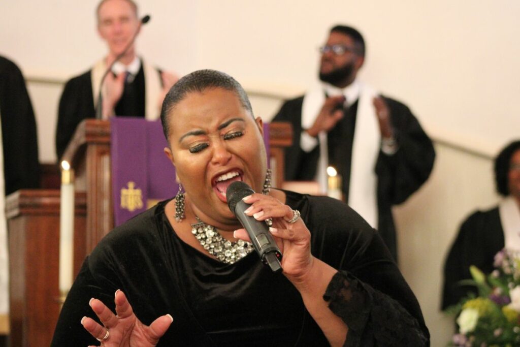 Pastor Karen Boston Jackson from Mt. Nebo UMC singing a solo during the service on Sunday at Mt. Pleasant UMC.