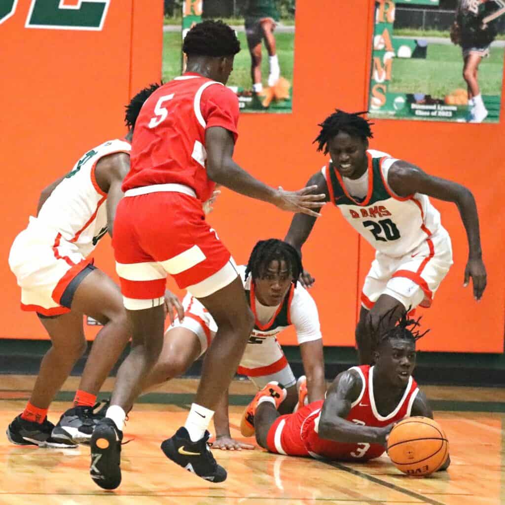 Santa Fe's Don'trell Jenkins dives after a loose ball against Eastside on Tuesday.