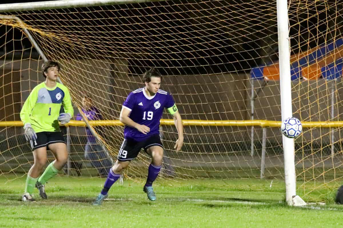 Gainesville goalkeeper Elijah Witt (1) and Chase Oyenarte (19) watch a Knights' shot go just outside the goal in Wednesday's 6A Regional Quarterfinal win over Oakleaf.
