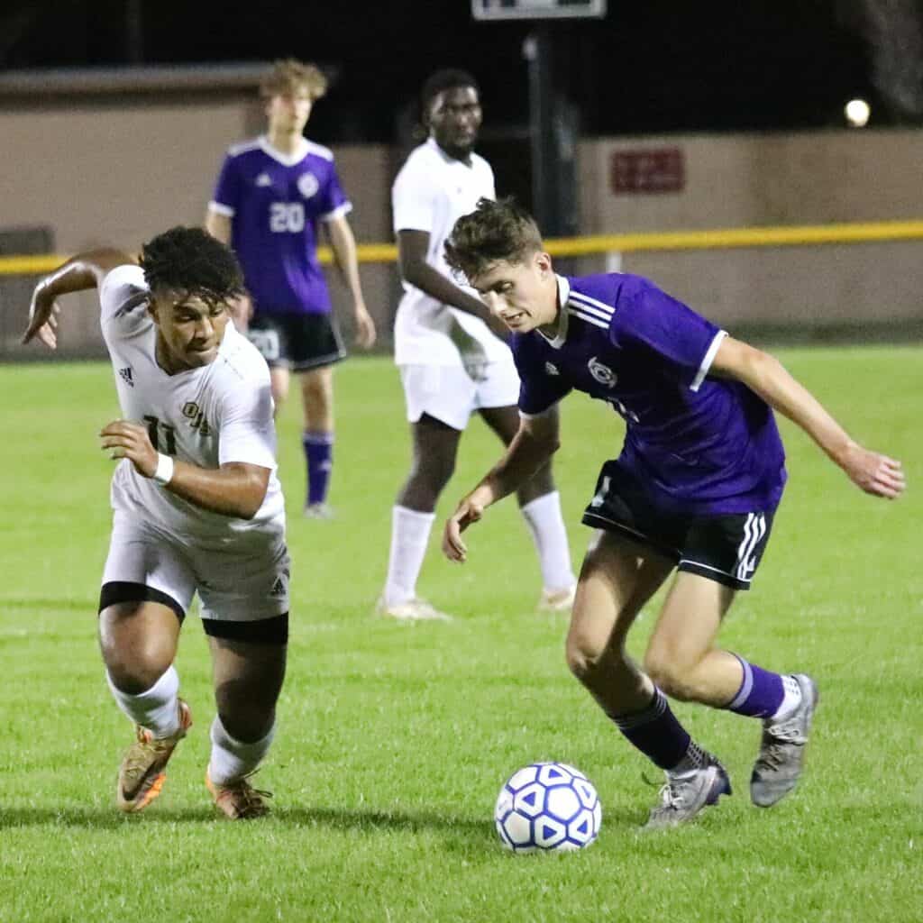 Gainesville's Brendan Foley dribbles downfield in Wednesday's 6A Regional Quarterfinal win over Oakleaf.