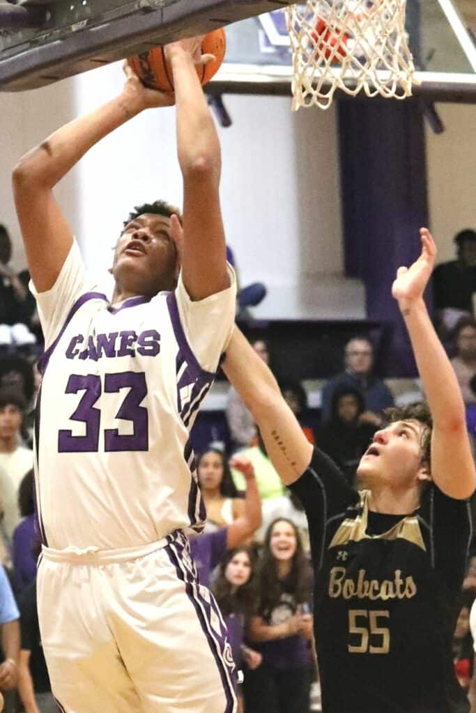 Gainesville's Josh Hayes goes for two against Buchholz's Ryan Webster late in the fourth quarter in the District 6A-2 championship game on Friday.