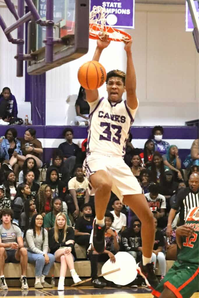 Gainesville's Josh Hayes with a fourth quarter dunk against Eastside on Thursday.