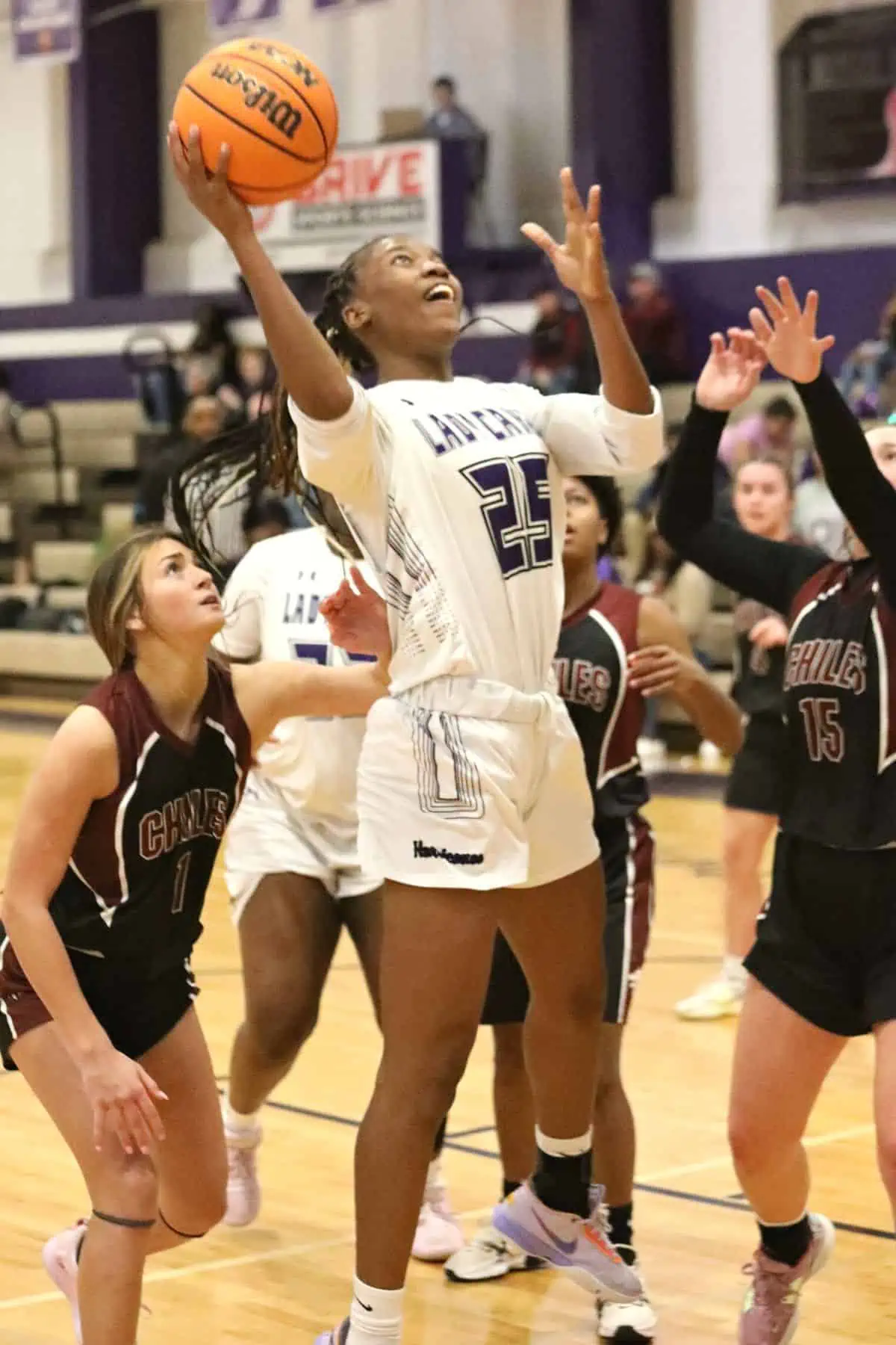 Gainesville's Leyah Houston shoots for two against Chiles on Friday.