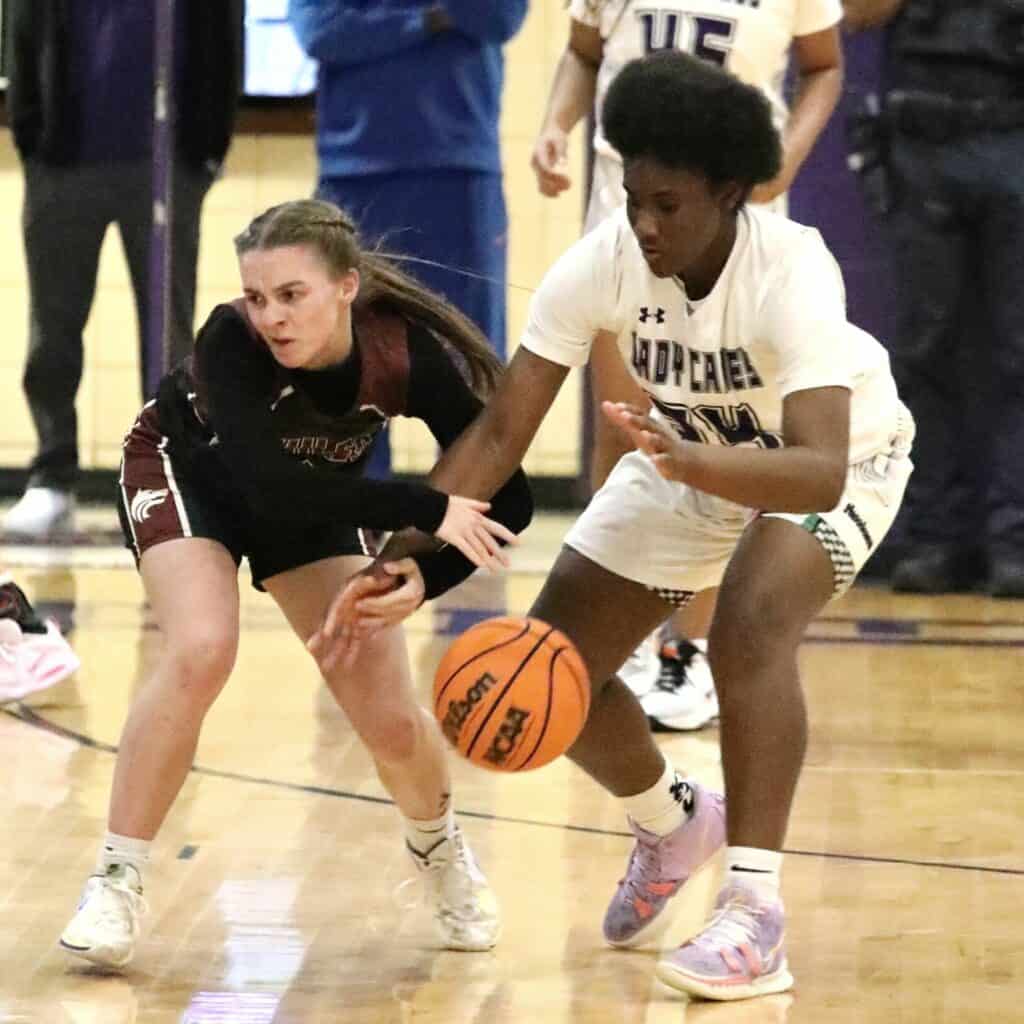 Gainesville's Ne'yanna Ross goes for the steal in the second half against Chiles on Friday.
