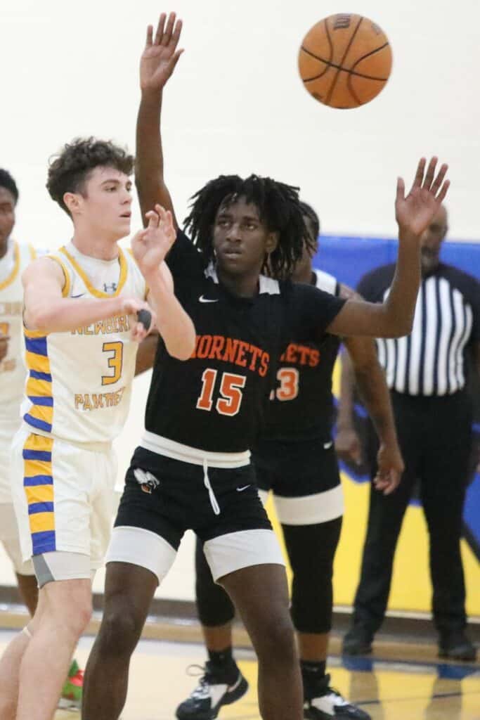 Hawthorne's Isaac Taplis defends Newberry's Mason Smith in the District 1A-6 championship game on Friday.