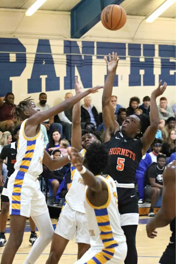 Hawthorne's Jammel Gillins with a shot against Newberry in the District 1A-6 championship game on Friday.