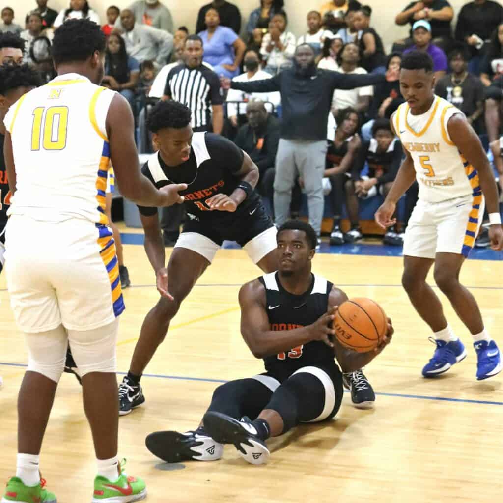 Hawthorne's Tyler Jefferson snags a lose ball against Newberry in the District 1A-6 championship game on Friday.