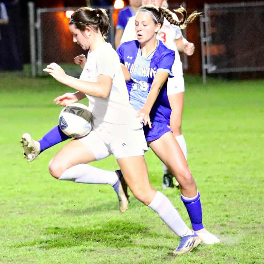 Keystone Heights' Elizabeth Waughon snags the ball from P.K. Yonge's Mae Dodd on Thursday.