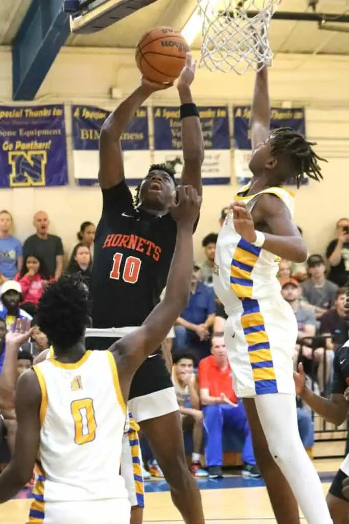 Newberry's C.J. Ingram shoots against Newberry in the District 1A-6 championship game on Friday.