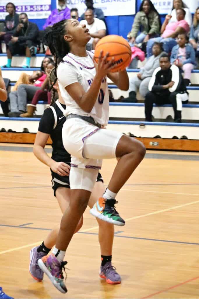 P.K. Yonge's Ashlyn Young drives to the basket against Master's Academy in the Region 1-3A semifinals game on Tuesday.