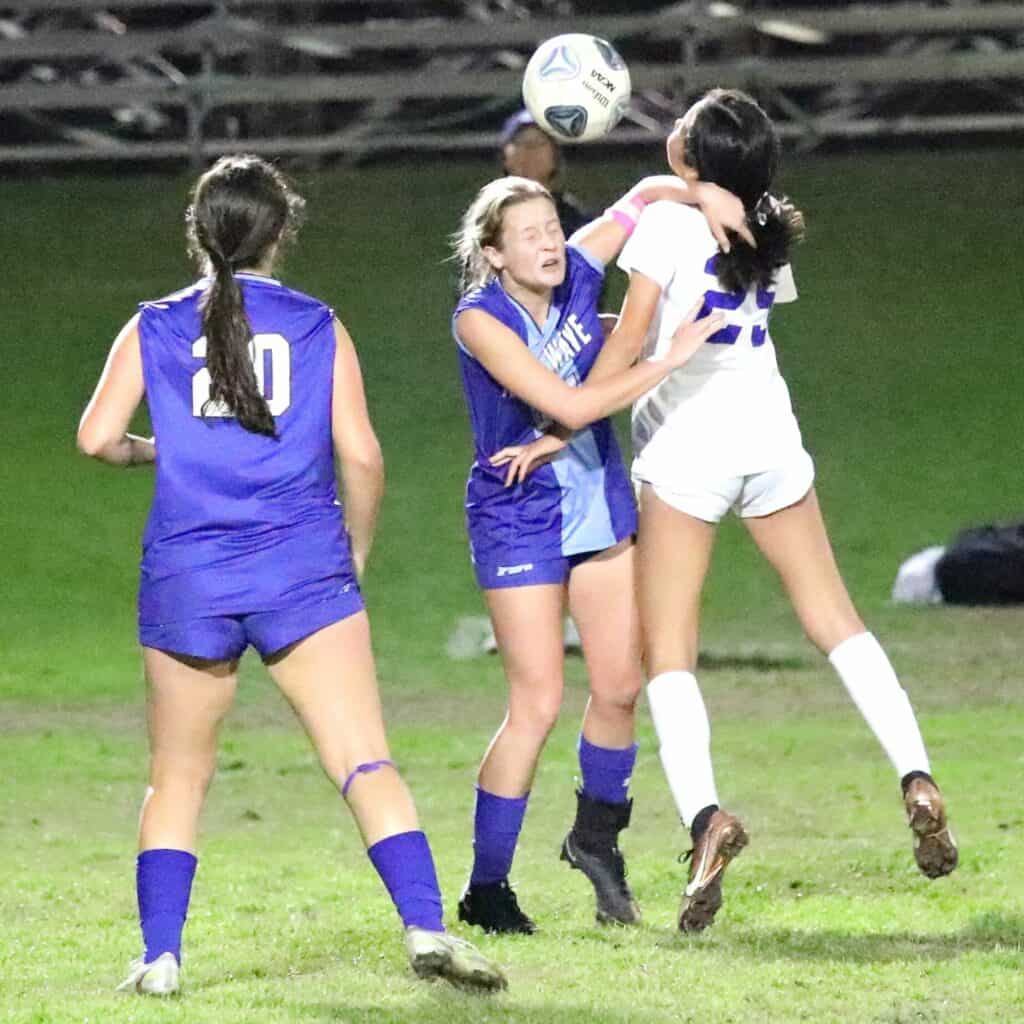 P.K. Yonge's Chloe Westbrook battles for the ball against Bolles in the Region 1-3A final game on Tuesday.