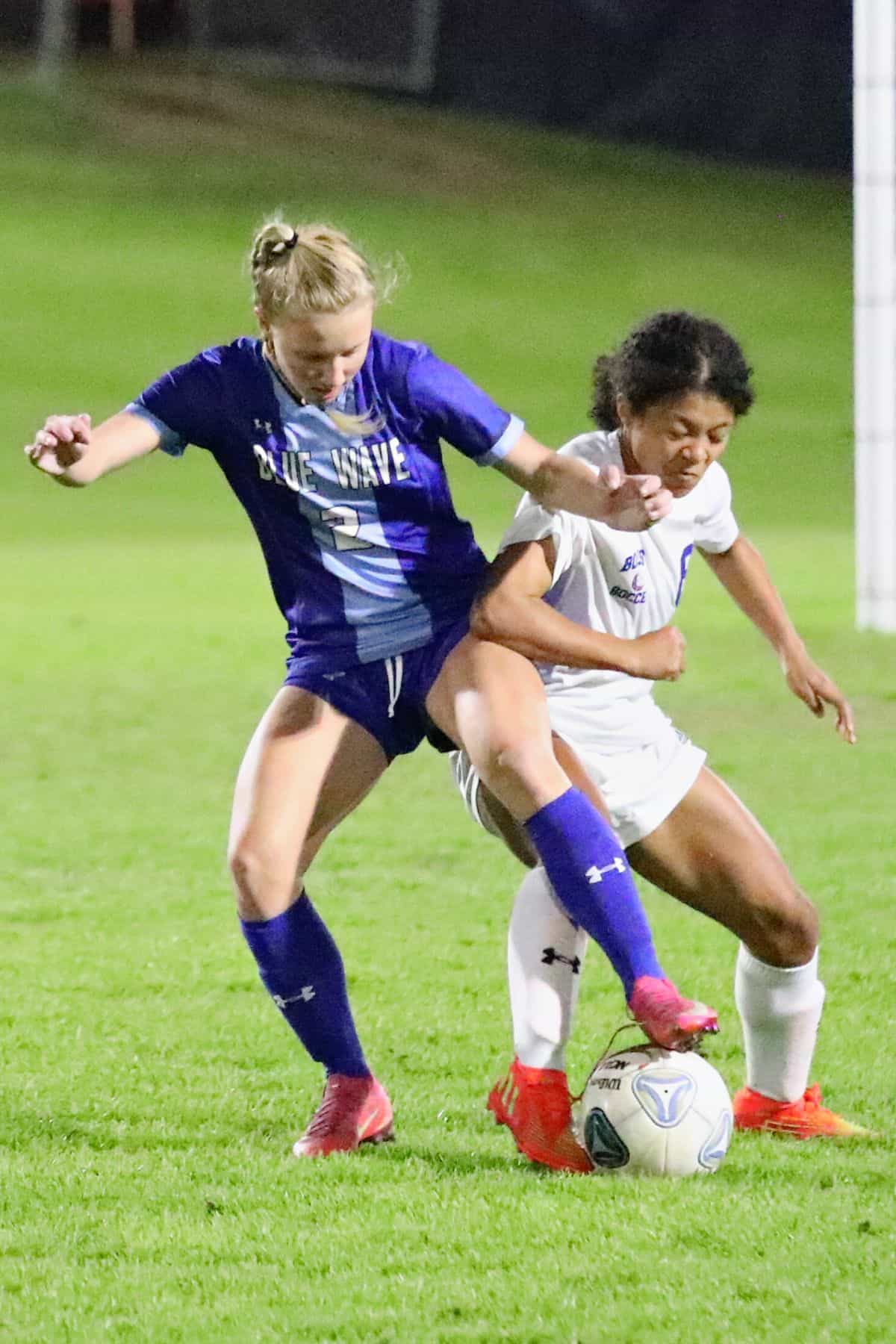 P.K. Yonge's Faith Hardy battles for the ball against Bolles in the Region 1-3A final game on Tuesday.